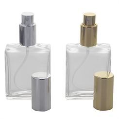 2 eckige Flakons, Glas, leer 50 ml Kosmetex mit silber.und gold. Zerstäuber Einheit. 